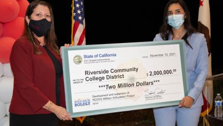 Assemblymember Presents Check